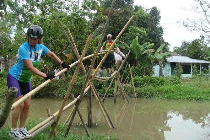 3 Days Cycling Mekong Delta - Day 1 in Cai Be: orchards, durian tasting, and a floating-market start
