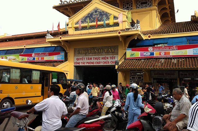 Afternoon Half-Day Introduction to Saigon Tour - Ben Thanh Market: Souvenir Browsing Plus Everyday Saigon