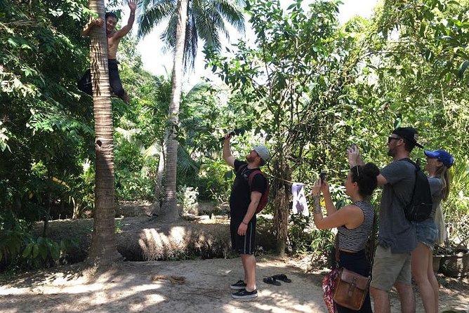 Authentic 'Non-Touristy' Mekong Delta Ben Tre 1 Day Private Tour - Canal time in Ben Tre: sampans, rowing, and coconut waterways