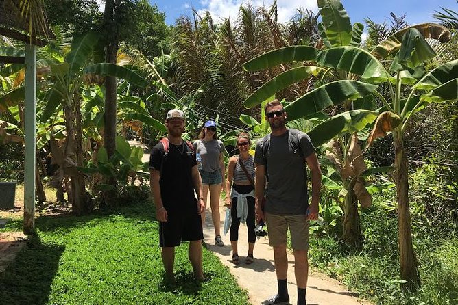 Authentic 'Non-Touristy' Mekong Delta Ben Tre 1 Day Private Tour - Riding a bike in Ben Tre: close views without the hard selling