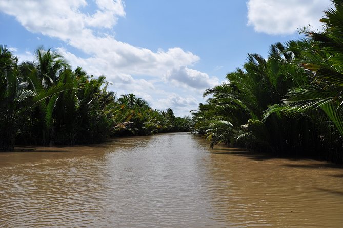 Cu chi Tunnel & Mekong Delta Full Day BBQ Lunch Lux Group 10 pax - Cu Chi Tunnels: learning how people survived underground