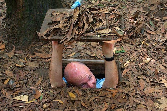 Cu Chi Tunnels underground half day tours - District 1 pickup at 7:30 and the A/C ride to Cu Chi