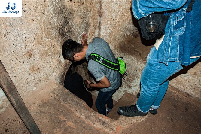 Explore Cu Chi Tunnels & Saigon History 1 Day Tour - Secret Weapons Cellar and the hidden-bunker angle
