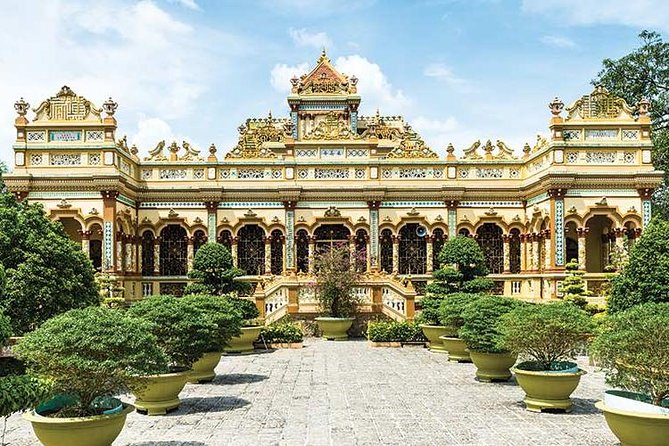 From HCM City: Mekong Delta Tour with Sampan Journey - Vinh Trang Pagoda: quiet architecture with a living southern vibe