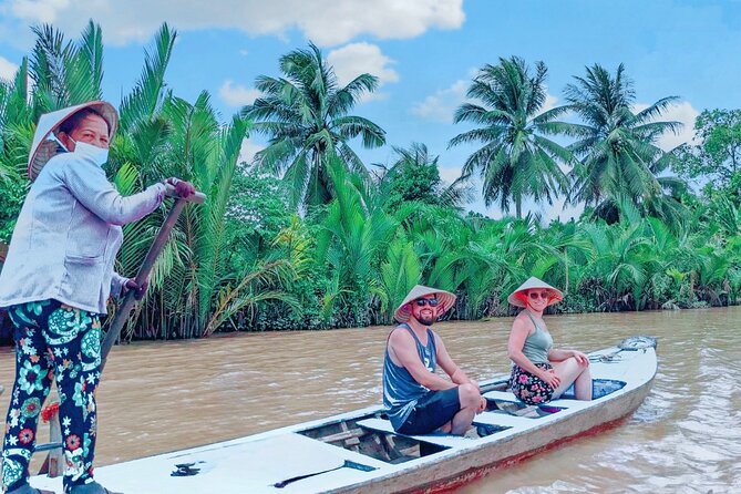 From HCM City: Mekong Delta Tour with Sampan Journey - The sampan ride through coconut-lined canals