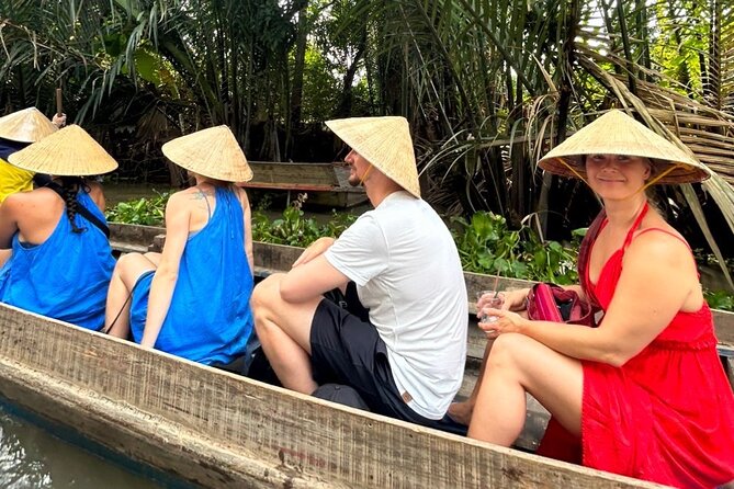 From HCM City: Mekong Delta Tour with Sampan Journey - Unicorn Islet: fruit tasting, honey tea, and folk music