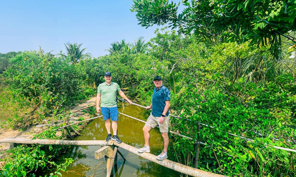 From HCM: Cost-Saving CuChi Tunnel & Mekong Delta 1-Day Tour - Mekong Delta boating: coconut canals, sampan rides, and fish/bee stops