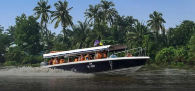 From HCM: Cu Chi Tunnels Half-Day Tour by Speedboat or Bus - From District 1 Pickup to Bach Dang Pier: The Ride That Sets the Tone
