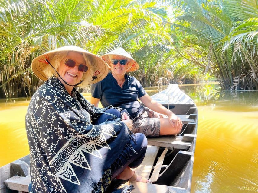 From Ho Chi Minh City: Visit Mekong Delta & Ben Tre In 1 Day - Vinh Trang Pagoda: giant Buddha statues in a mixed-influence setting