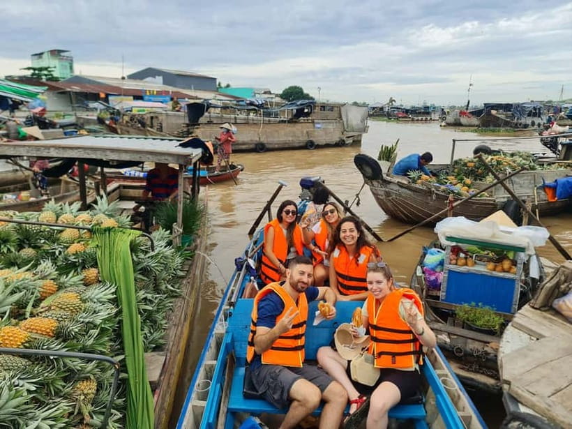 From Ho Chi Minh: Mekong & Cai Rang Floating Market 2D1N - Day 1: Ho Chi Minh to My Tho and Ben Tre, with boats and pagoda stops
