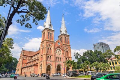 Full-Day Ho Chi Minh City Tour with Colonial Heritage & Chinatown - Notre Dame Cathedral exterior: short stop, big photo impact