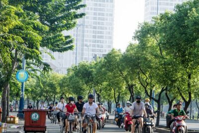 Half Day - Saigon Off-the-Beaten-Path - City Cycling Tour - District 10: a calmer tempo, plus Umbrella Market and old apartment blocks