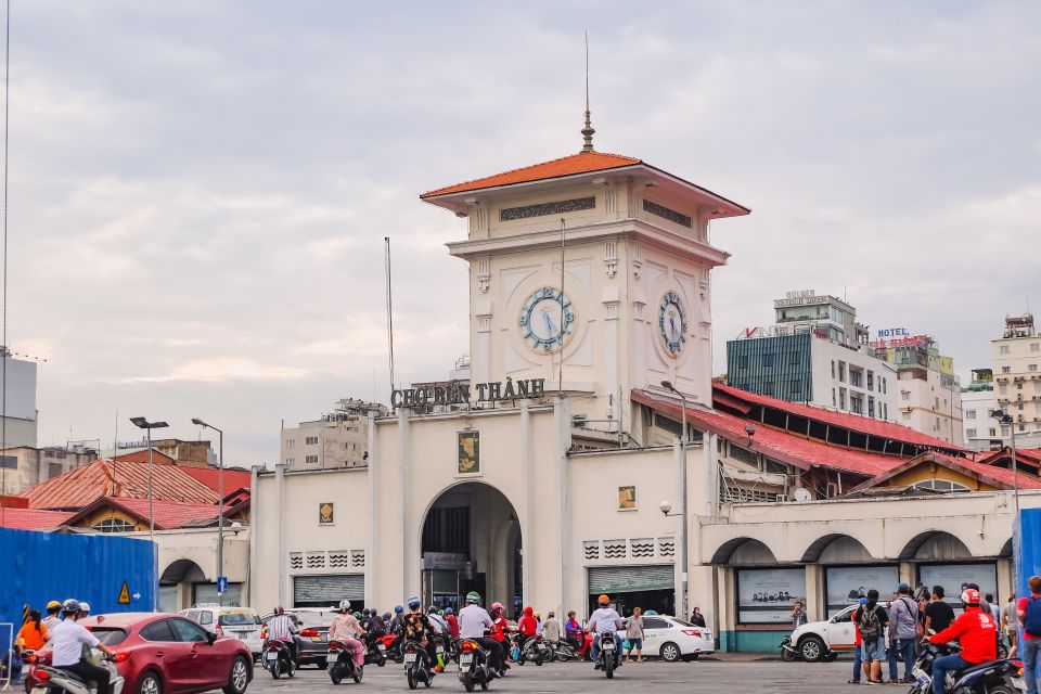 Ho Chi Minh City: History Museum and Ben Thanh Market Tour - Getting there and staying comfortable: walking in the heat with a plan