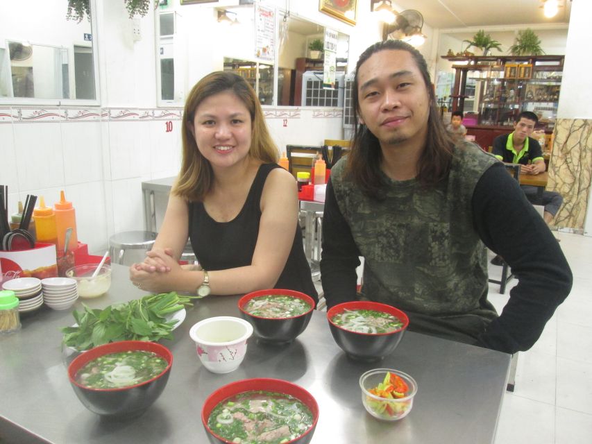 Ho Chi Minh City: Midnight Motorbike Tour - Floating-market style fruit: sweet, simple, and very Saigon
