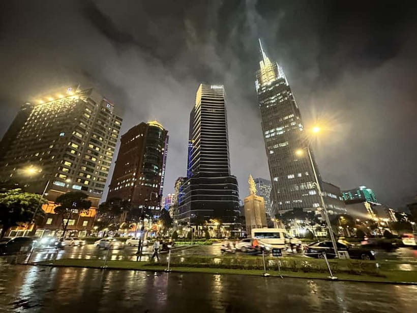 Ho Chi Minh City: Night Walking Tour with Hidden Gem Stop - The District 1 quiet stop: a real breather and a strong photo moment