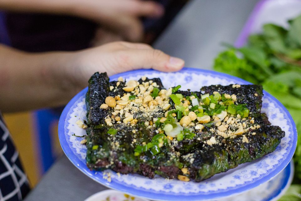 Ho Chi Minh City: Private Street Food Evening Walking Tour - BBQ seafood, seating like locals, and drinks with stories