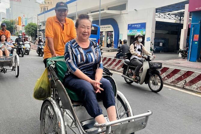 Ho Chi Minh City Sightseeing Panoramic Cyclo Private Tour - Independence Palace, Saigon River views, and the Pink Church