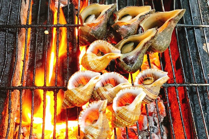 Ho Chi Minh Nightlife & Street Food Tour By Motorbike - Stop 3 in Chợ Lớn (Quận 5): Phố Tau Sai Gon and the street-scene vibe