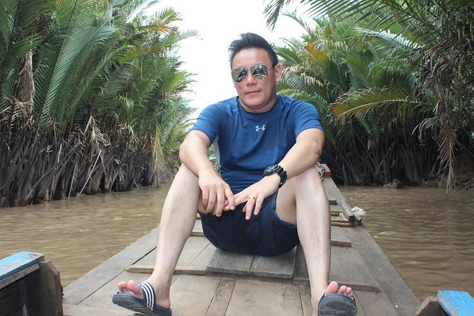 Mekong Delta Adventure from Ho Chi Minh City - Hand-Rowing Sampan Through Coconut Canals: The Pace Shift You’ll Feel