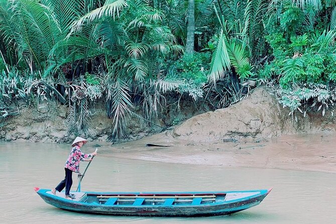 Mekong Delta Guided Tour from Ho Chi Minh City - Island home stop: fruit, honey tea, honey wine, and music