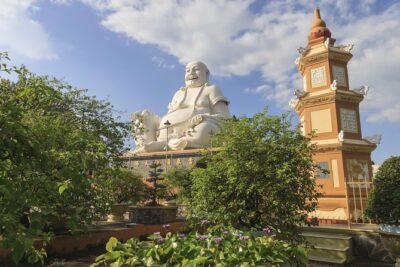 Mekong Delta Guided Tour from Ho Chi Minh City - Vinh Trang Temple: A Quick but Beautiful Buddhist Stop