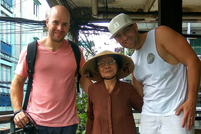 Morning Walking Food Tour in Non Tourist Area and Full of Local Life - Stop One at AN Tours Vietnam: banh cuon trung and pho chua dac biet