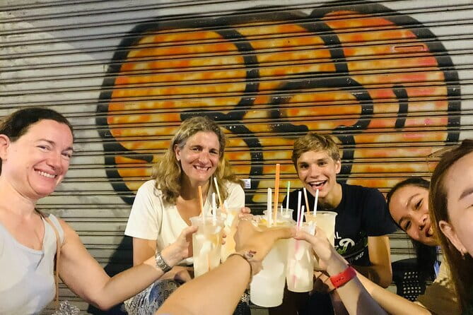 Night Food Tour in Saigon By Scooter - Rain is a real factor in Saigon nights