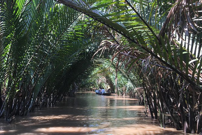 Private Cu Chi Tunnels and Mekong Delta: Full-Day Guided Tour - Fruit Orchards, Honey Tea, Coconut Candy, and the Sales Reality