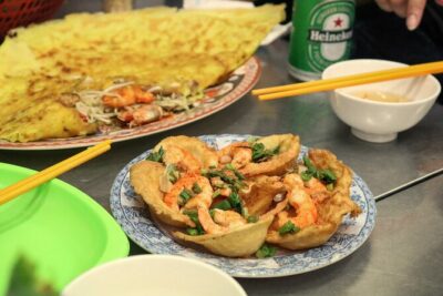 Private Local Food 4-hour Scooter Tour in Ho Chi Minh City - Stop 1: Hu tieu Thành Tín for Hu Tieu Nam Vang