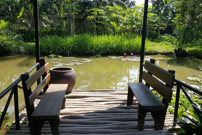 Private Mekong Delta Less Tourist - Coconut Island Tour - Vinh Trang Pagoda: a quick cultural stop with Eastern and Western influences