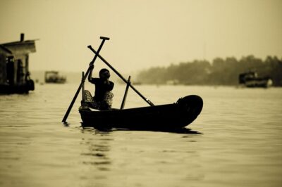Private Tour Mekong Delta Day Trip from Ho Chi Minh City - Vinh Trang Temple: bronze statues and Tien River views before the boats