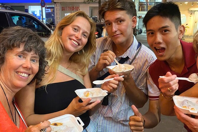 Saigon By Night: Authentic Street Food Scooter Adventure - The legendary bánh mì stop: crisp baguette and homemade pâté