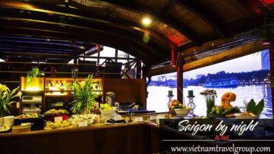 Saigon by Night: Traditional Dinner Cruise - Hotel Pickup in District 1 and the Cyclo Orientation Loop
