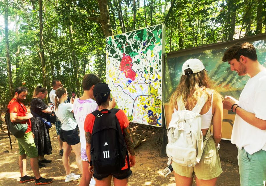 Saigon History & Cu Chi Tunnels with War Museum 1-Day Tour - Secret Entrance, 100-Meter Tunnels, and Booby Traps Explained on the Ground