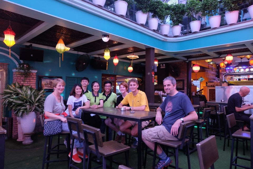Saigon: Night Craft Beer And Street Food Tour By Vespa - Rooftop sunset stop: beers with city views