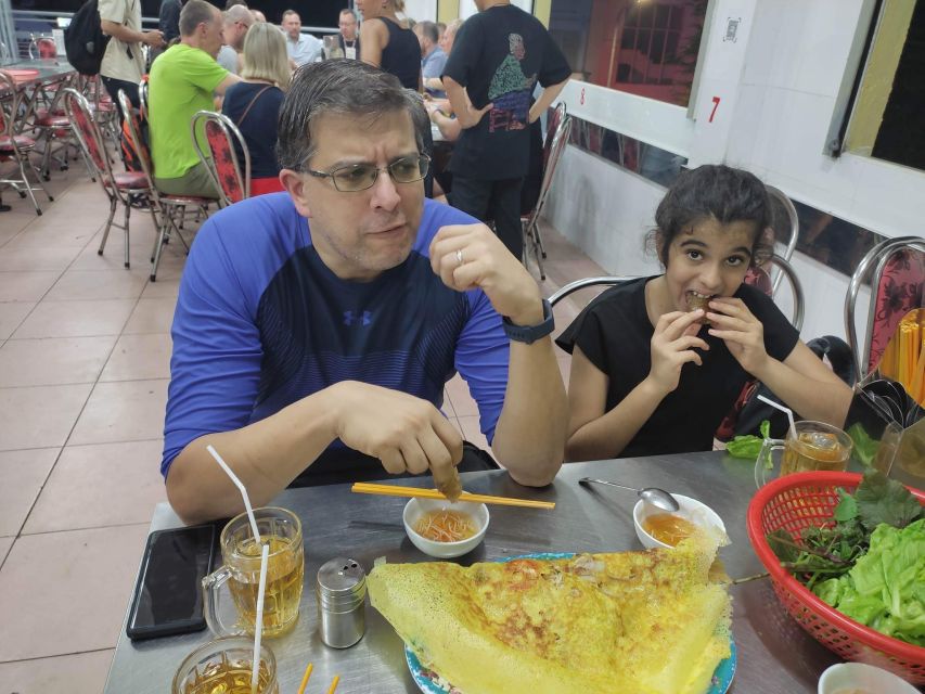 Saigon: Night Sightseeing And Street Food Tour By Vespa - The seafood finale: snails, variety, and local beer
