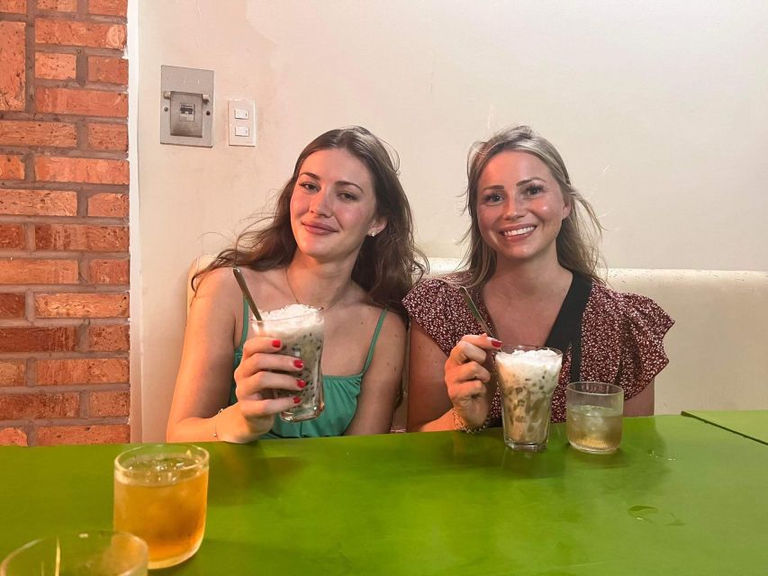 Saigon: Night Sightseeing And Street Food Tour By Vespa - Stop 1: Grilled pork vermicelli and spring rolls to kick things off