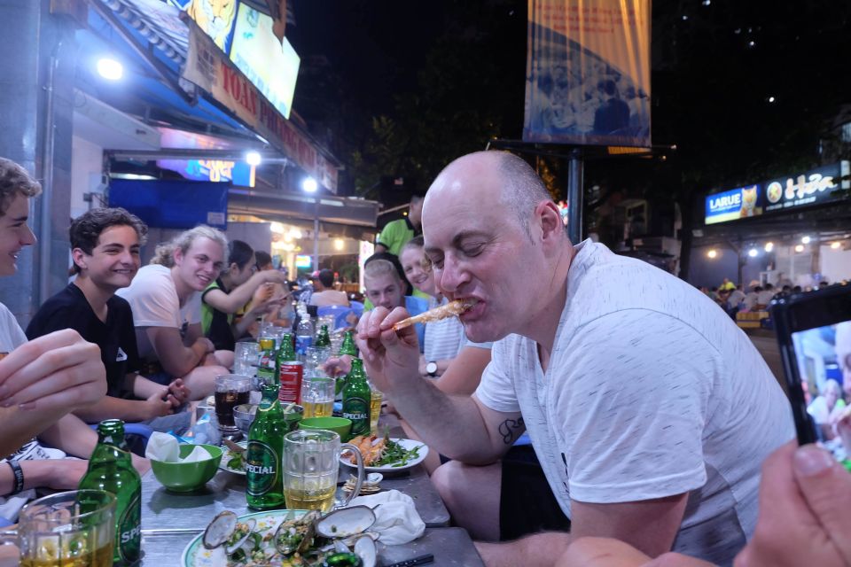 Saigon: Night Sightseeing And Street Food Tour By Vespa - Chinatown stops and banh xèo: wild vegetable pancakes with fish sauce