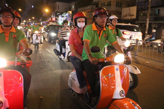 Saigon Vespa By Night Street Food Tour 4,5 Hours - First impressions at Saigon Opera House and Ho Chi Minh Square