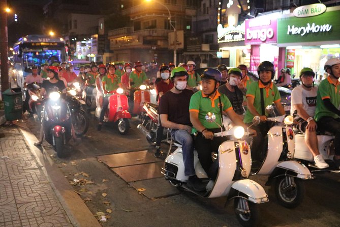 Saigon Vespa By Night Street Food Tour 4,5 Hours - Street-food dinner: two local restaurants and plenty of food moments