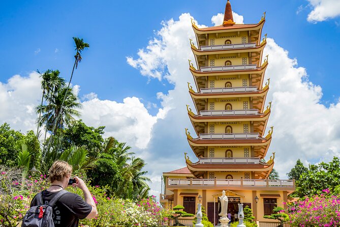 Small-Group Mekong Delta Day Trip: Boat Ride, Cottages & Pagoda - Cruising the Mekong: motorboat canals, Rạch Miễu Bridge, and real river life