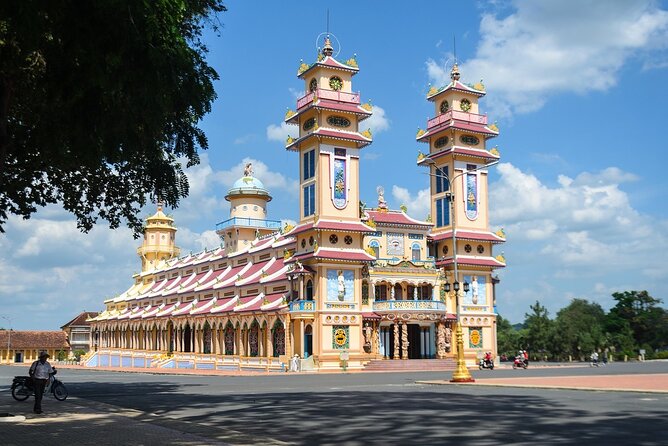 Tay Ninh Holy See - Cable Car & Cu Chi Tunnels | Small Group Tour - Morning pickup and the ride out of District 1