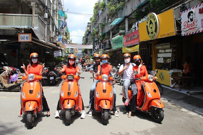 The Insider's Saigon With Female Ao Dai Riders Vespa 4,5 Hours - Ho Thi Ky flower market: a feast for the senses on two wheels