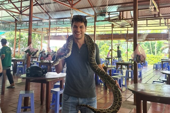 VIP Tour: Cu Chi Tunnels & Mekong Delta 1 Day | Shooting Guns - Lunch at a Local Restaurant, Plus Fruit and Honey Tea